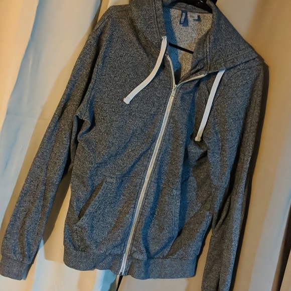 grey jacket with white strings